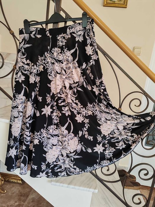 Fustă amplă,de vară,material fin, elegantă.