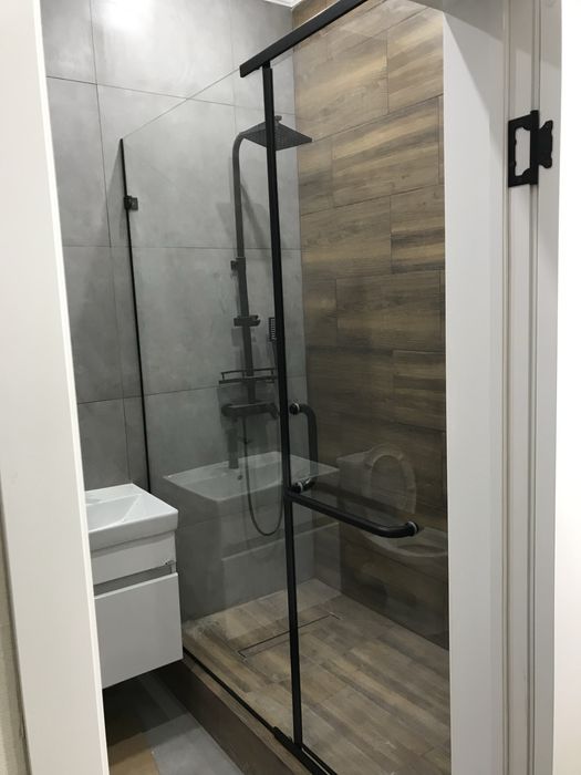 Душевые кабины и ванные перегородки