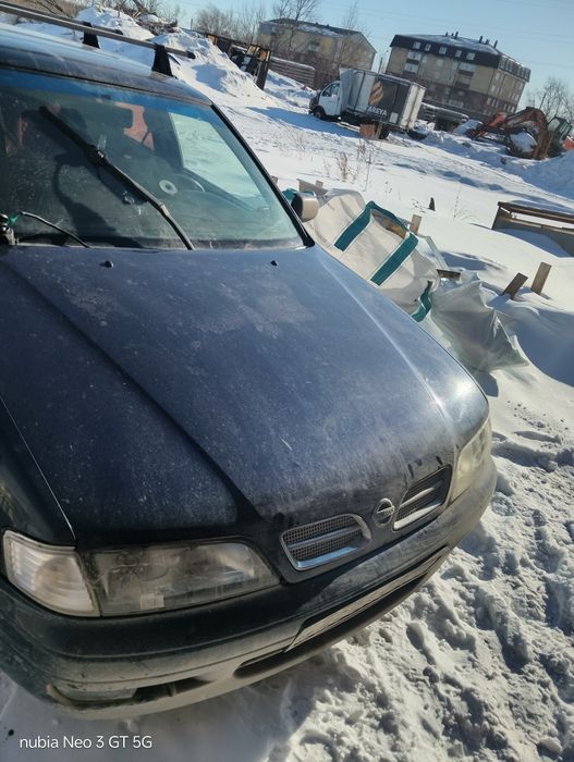 Ниссан премьера р11