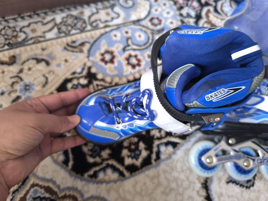 Роликовые коньки