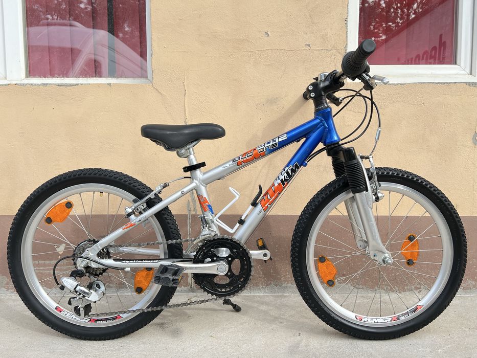 Bicicleta MTB copii KTM 20 Inch Aluminiu 18 viteze Shimano furca suspensie