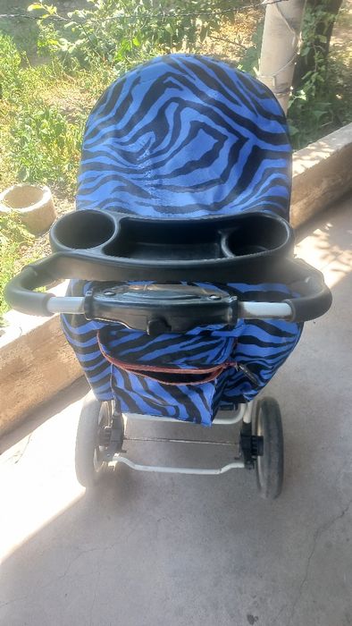 Коляска трехколесная