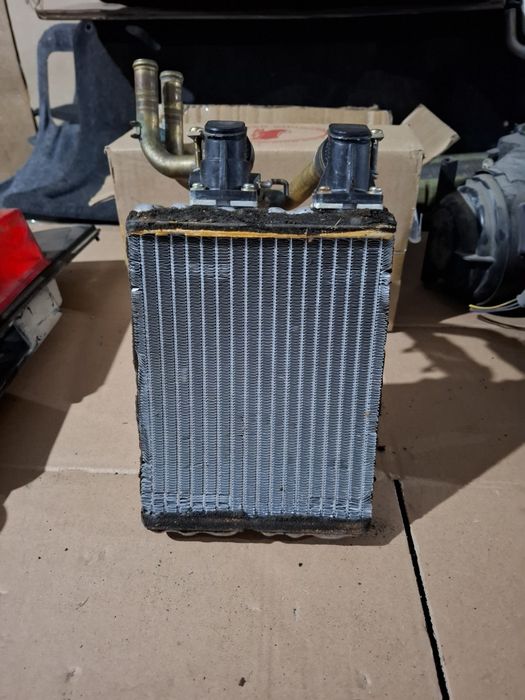 Радиатор печки Форд Маверик