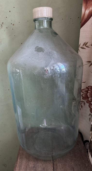 Продам Бутыль стеклянный