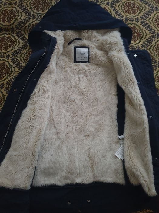 Плащь кожанный с мехом.