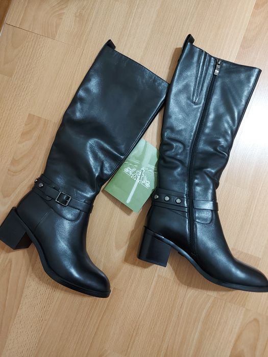 Продам  сапоги новые