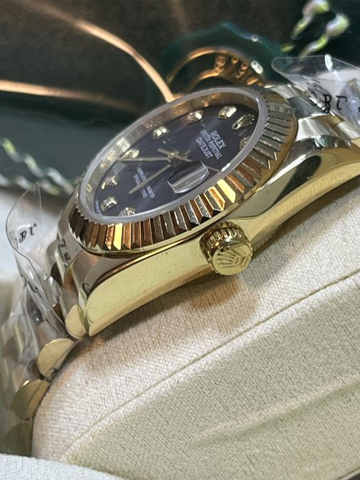 Rolex Date Just de dama 28mm