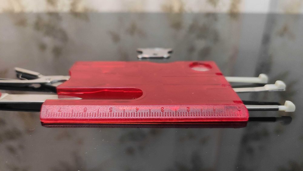 Мультитул по типу Swiss Card(Китай) - ножницы, ручка, фонарь, отвёртка