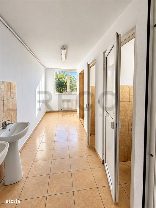 RECO Spatiu Comercial, Santion