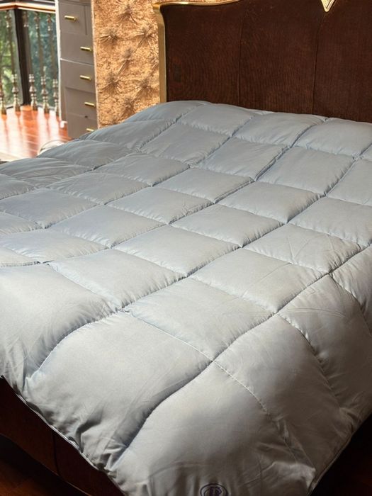 Одеяла и подушки Hilton