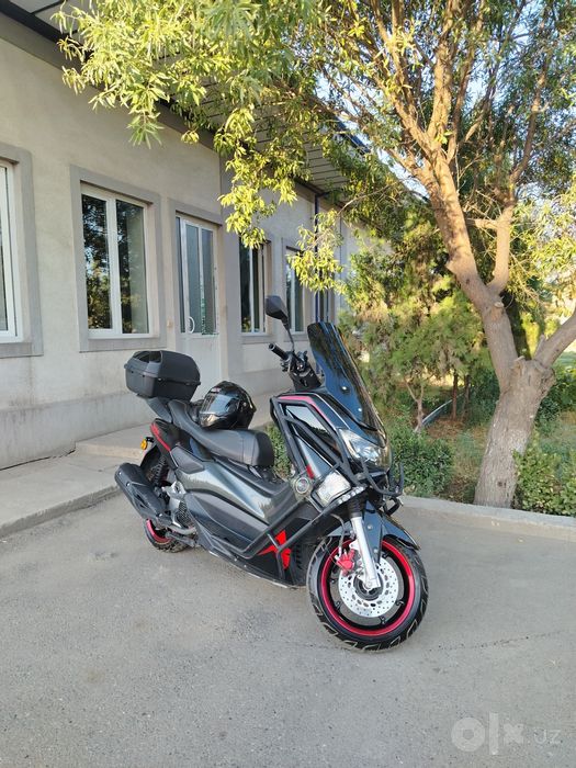 Moto skuter ikki oyoqlik