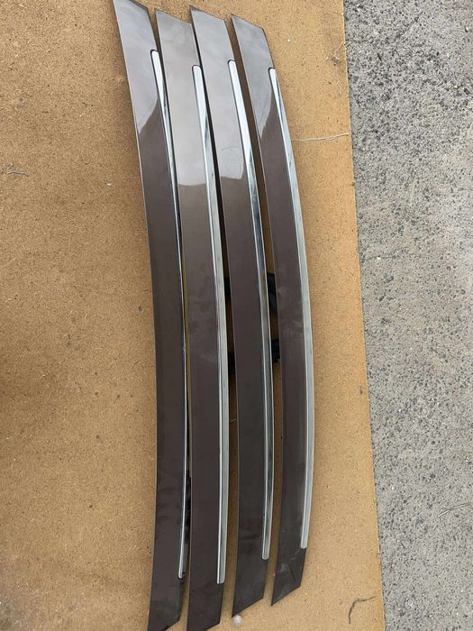 Elemente ornamentale,grile,bandouri noi originale Logan,Sandero,Duster