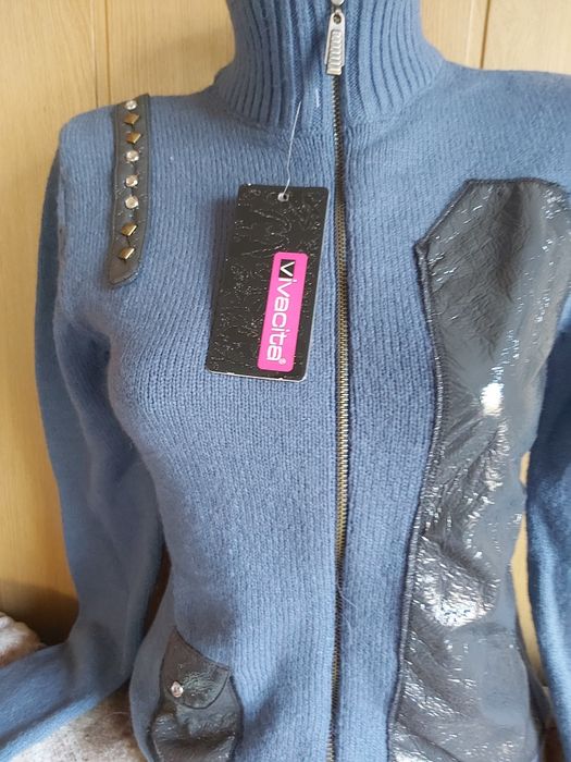 Продам свитера женские  (новые)