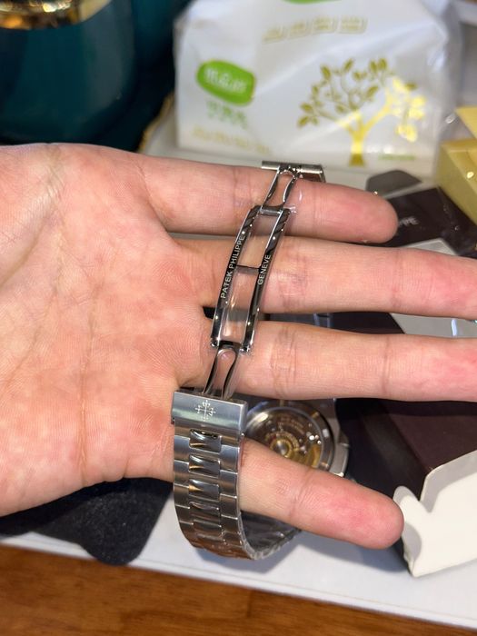 Patek philippe nautilus часы
