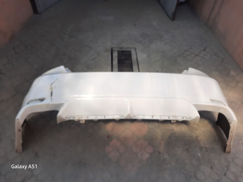 Задний бампер в оригинале Камри 75 SE