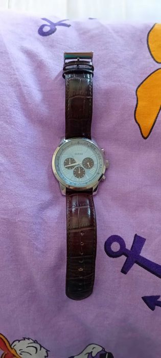 Ceas guess,purtat de cateva ori.
