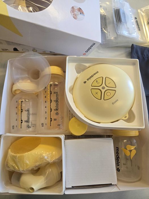 Молокотсос Medela Swing