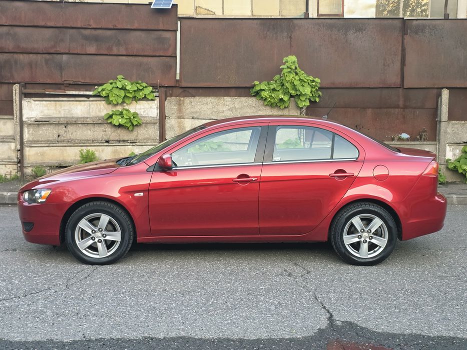 Mitsubishi Lancer 2009 66.00km 1.5 benzină Navi Android Waze Youtube Rate / Cash / buyback