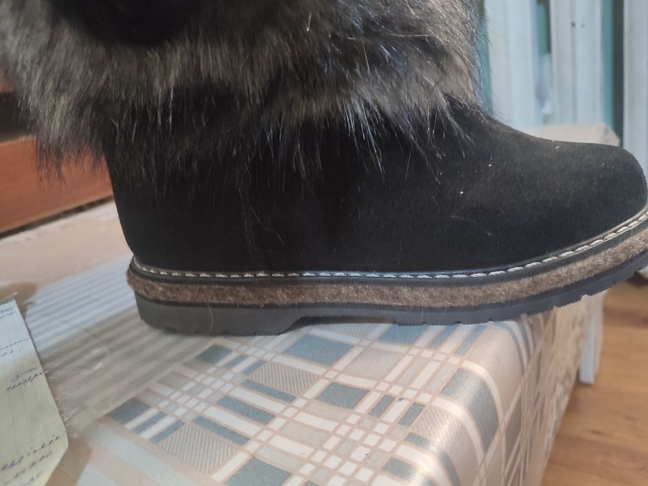 Продам новые  тёплые унты.