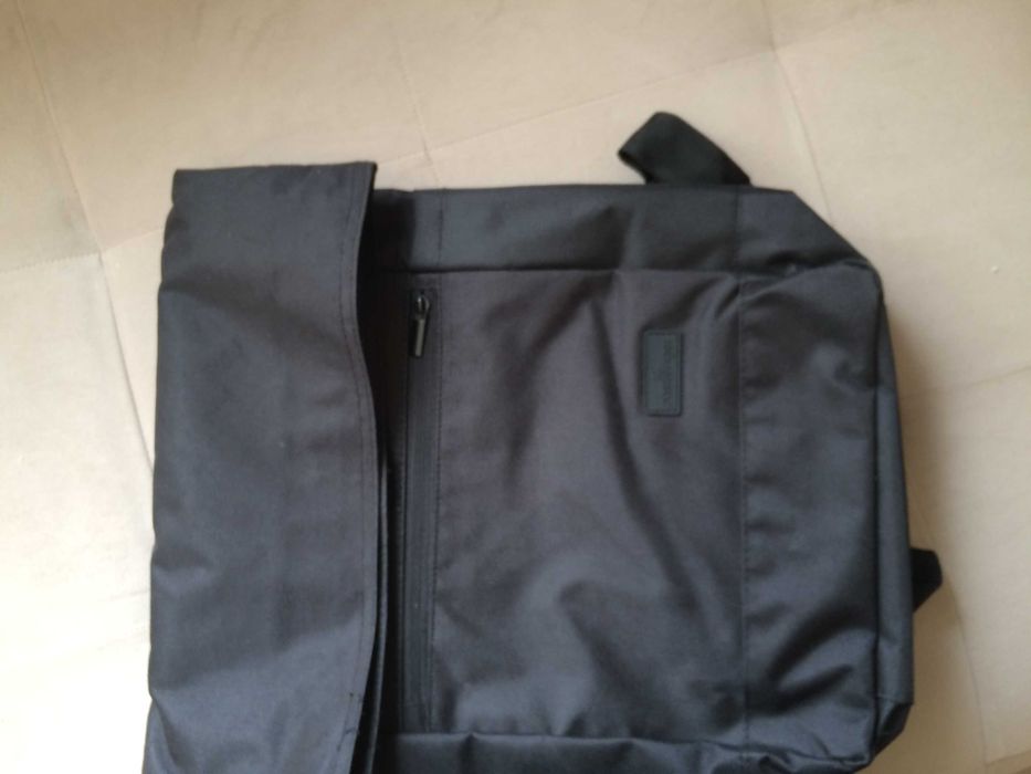 Чисто нова черна раница.