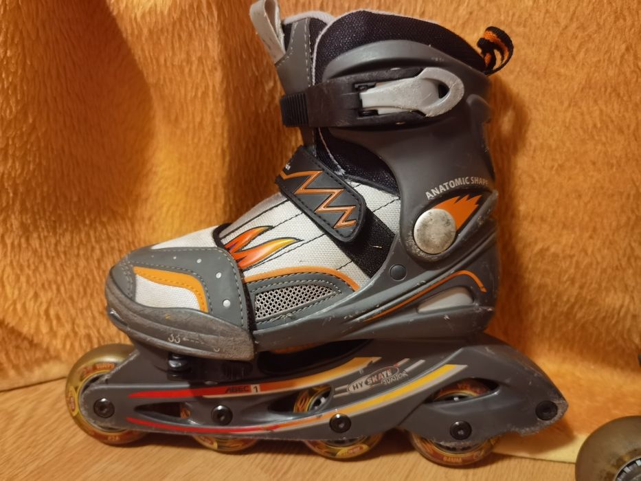 Role / patine reglabile 31-33