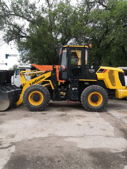 Услуги фронтального погрузчика и эксковатора