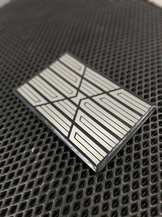 Подпятники для автомобилний ковриков