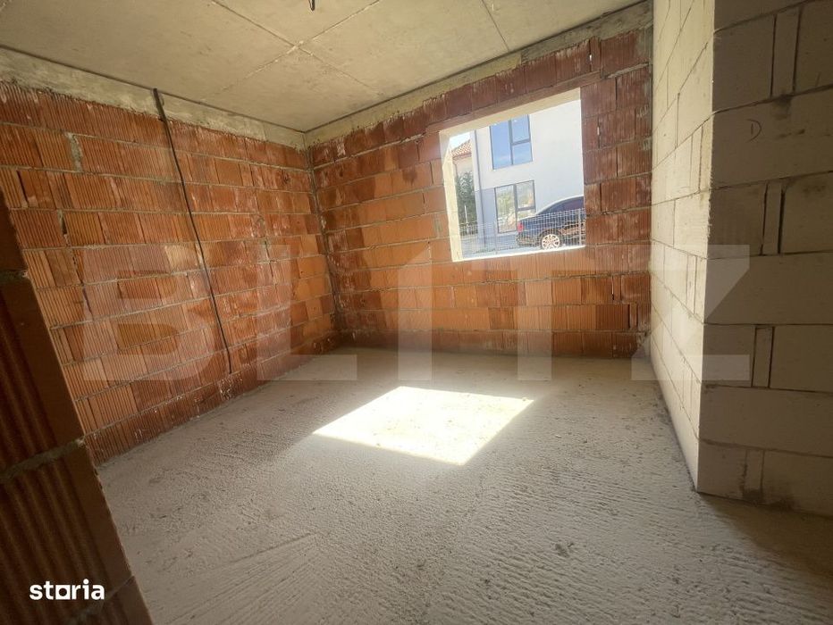 Apartament cu 3 camere, dispus pe doua niveluri, cu gradina