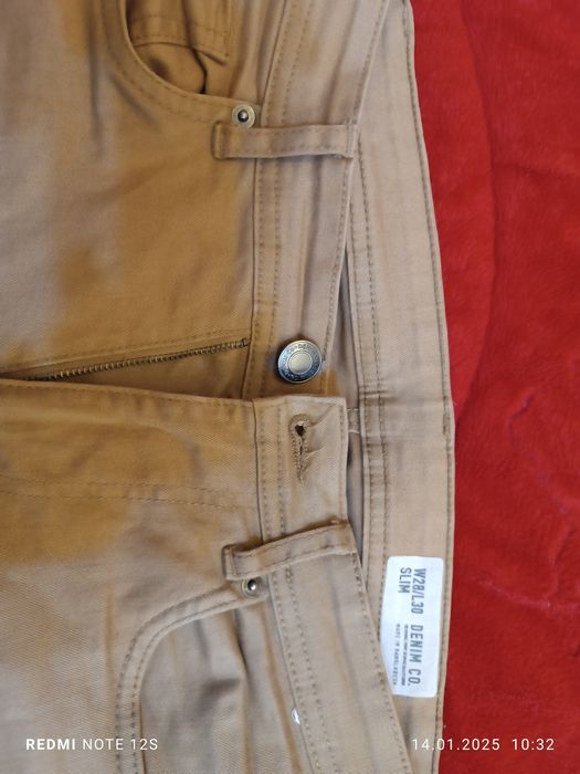 Джинсы коричневые