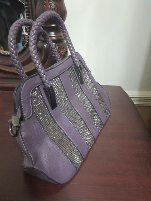 Ayollar sumkasi holati yangi