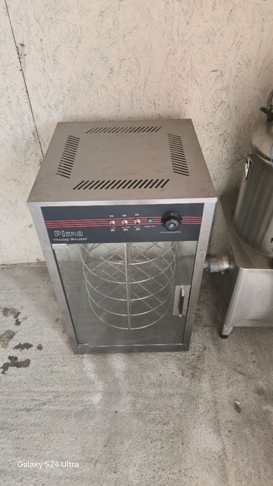 Vand vitrina calda rotativa pentru pizza, senvisuri etc .