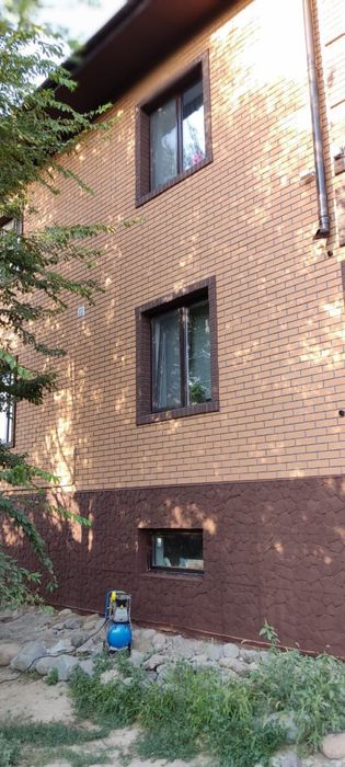 фасадные панели под травертин для вашего дома