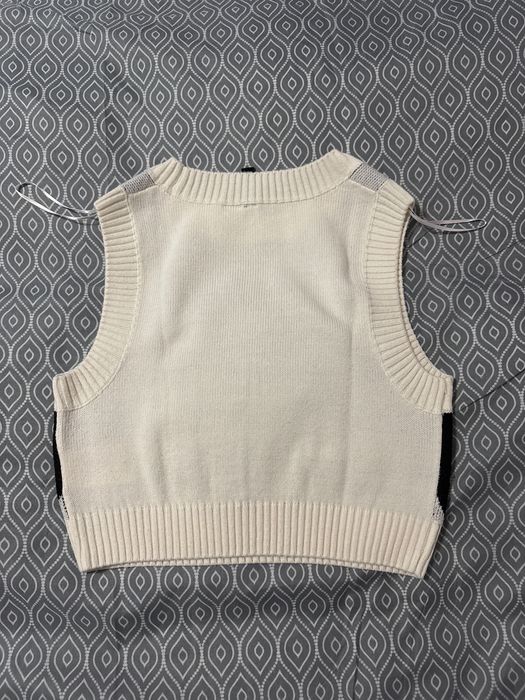 Къс топ без ръкав