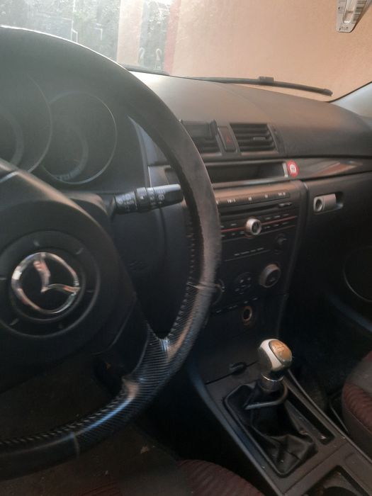 Capota.usi .interior Mazda 3