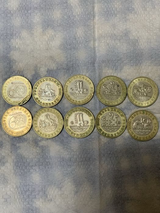 комплекты юбилейных монет 2003 г. поодаю