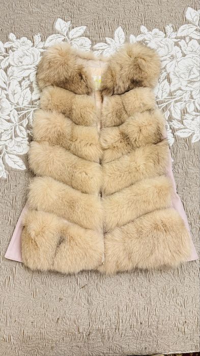 Продам жилетку меховую