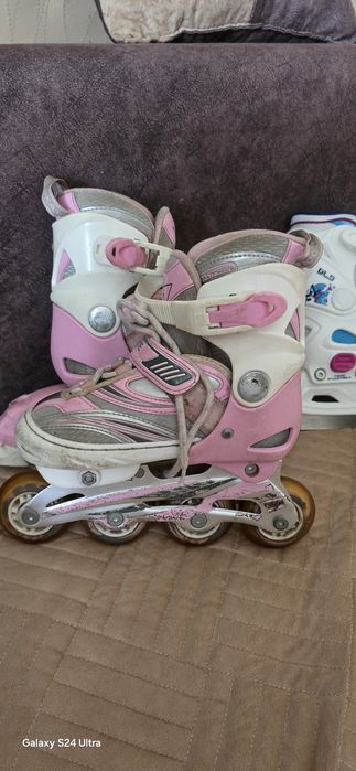 Роликовые коньки