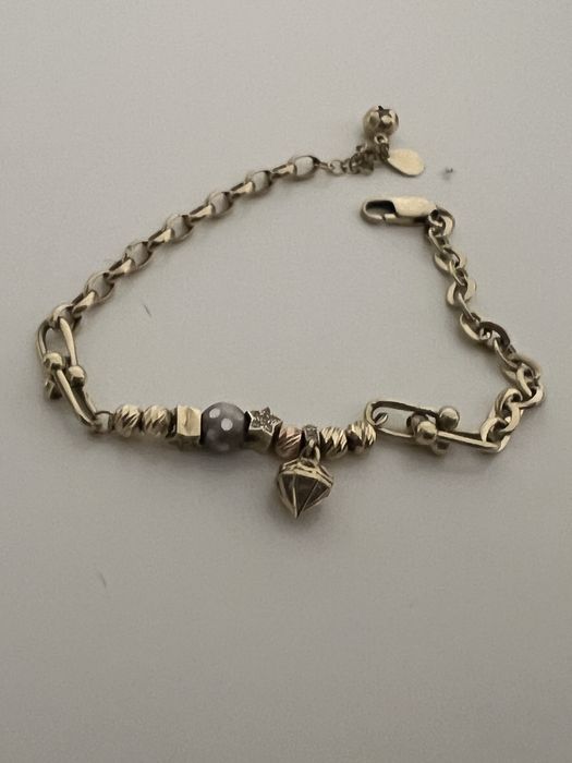 Bratara aur tip Pandora model deosebit 14k persoana fizica