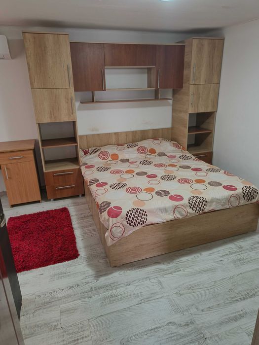 Inchiriez casa:dormitor+living+bucatarie+baie+foisor+curte+parcare