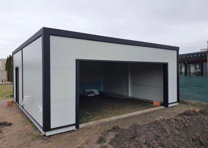 DESCRIEREDESCRIERE
Garajele standard din panoiri sandwich pe care le f