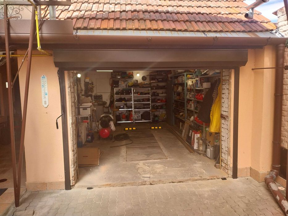 Usi de garaj sectionale si automatizari pentru porti