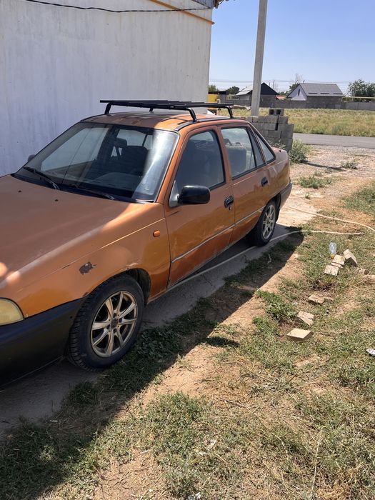 Нексеия 1 2002жыл