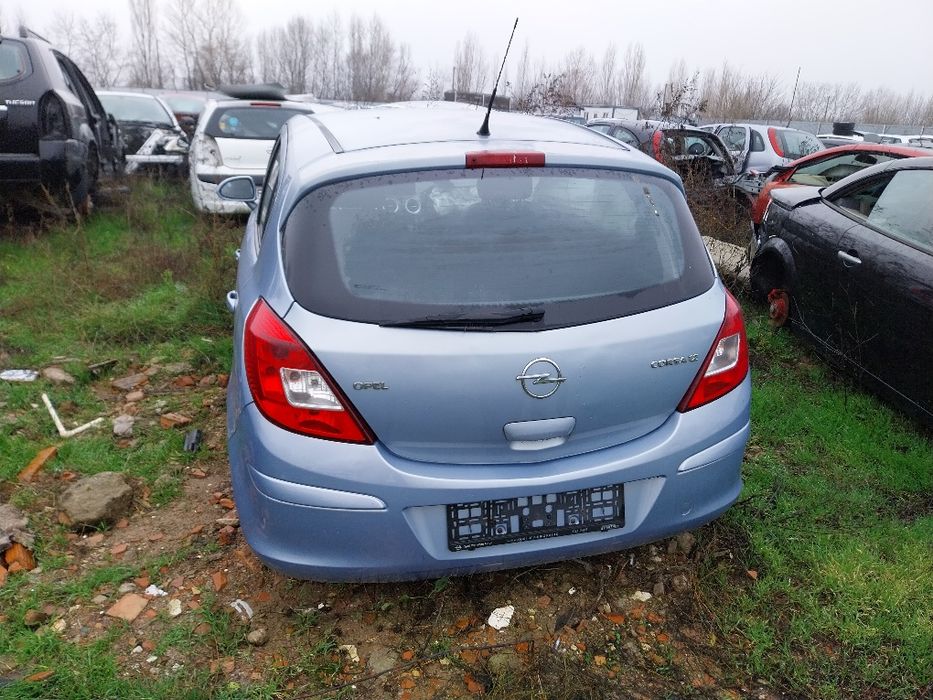 Opel corsa D stopuri hayon bara usi ușa scaune oglinda portbagaj aripa aripi Oglinzi armatura bara capota faruri far cutie viteze motor alternator