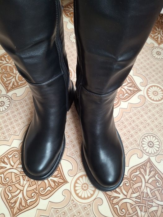 Продам новые сапоги