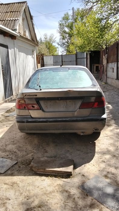 Ниссан Примера P11