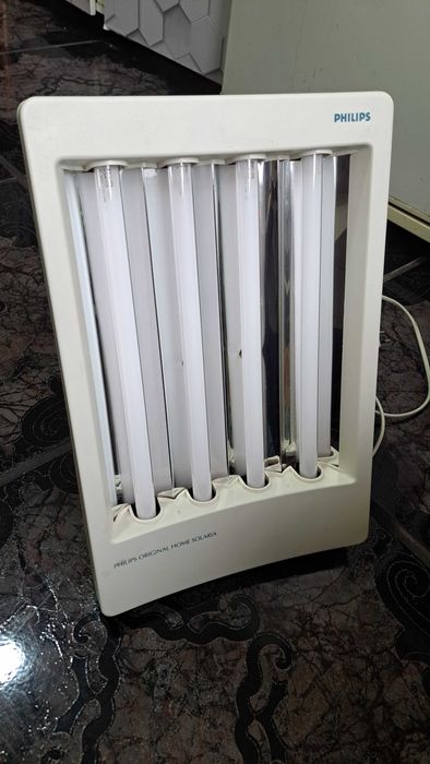 Solar facial bronzare Phillips