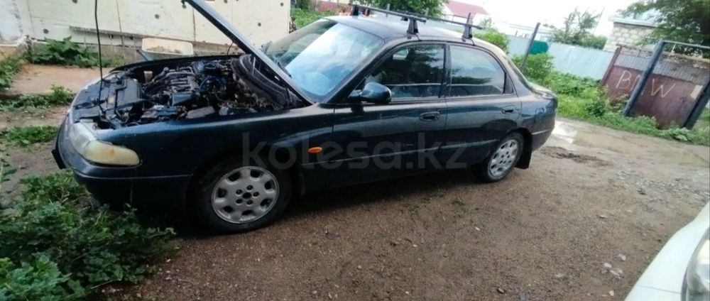 Мазда Кронос 1.8
