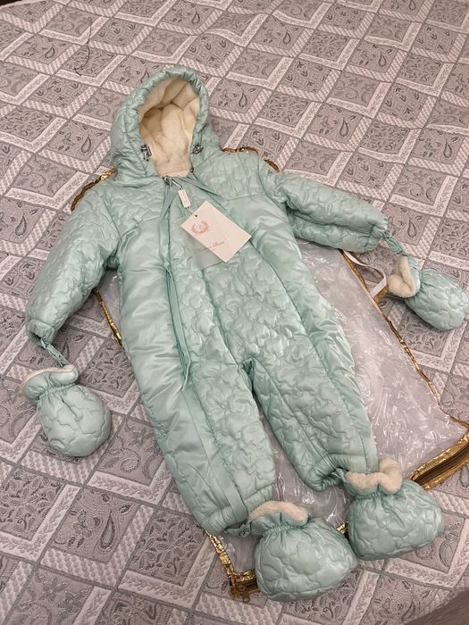 Продам детские комбинезоны