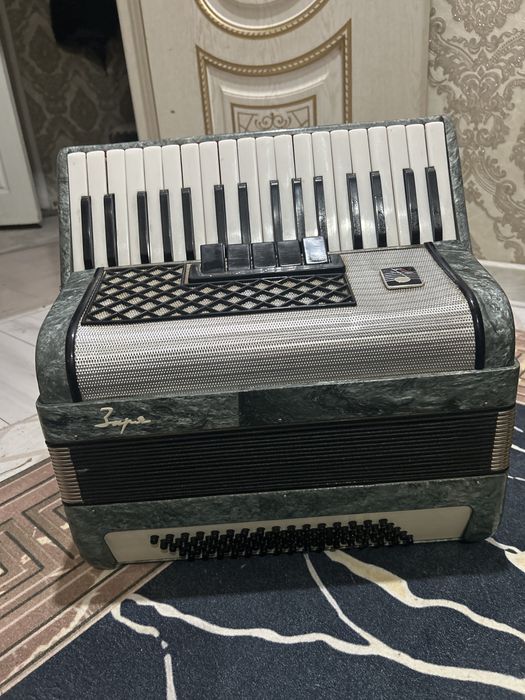 аккардион почти не игранный