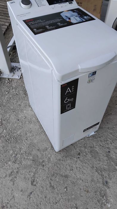 Пералня AEG с горно зареждане